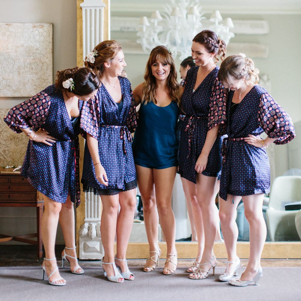 Bridesmaids & Bride Getting Ready in Navy Robes