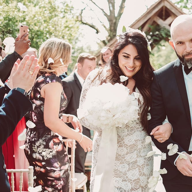 Bride in Grace Love Laces Wedding Dress | Groom in Tuxedo | Outdoor Wedding at Millbridge Court | Lemonade Pictures
