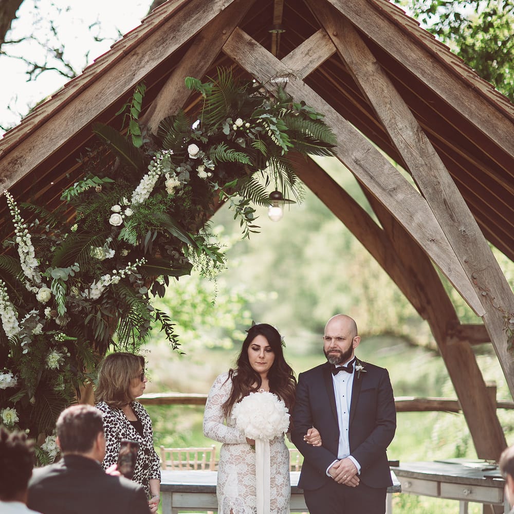 Bride in Grace Loves Lace Wedding Dress | Groom in Tuxedo | Lemonade Pictures