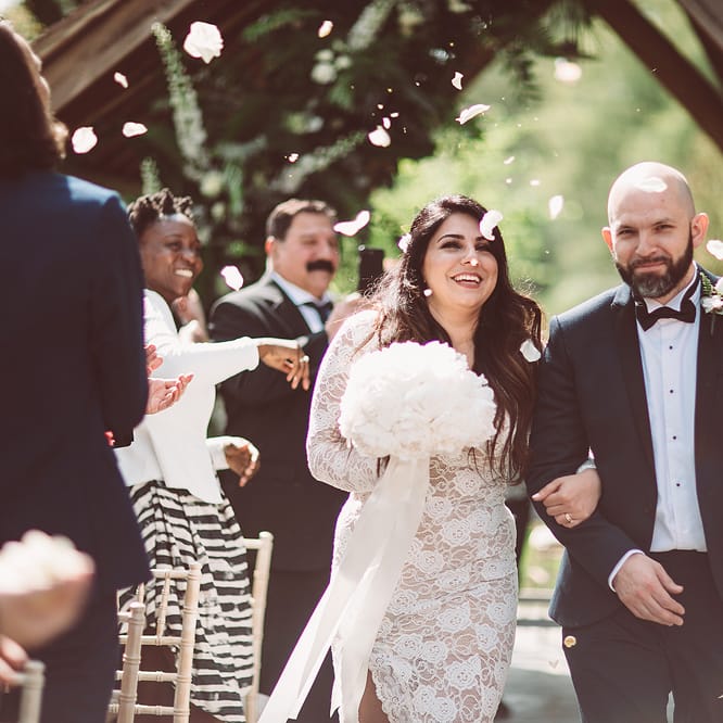 Confetti Moment | Bride in Grace Loves Lace Wedding Dress | Groom in Tuxedo | Lemonade Pictures