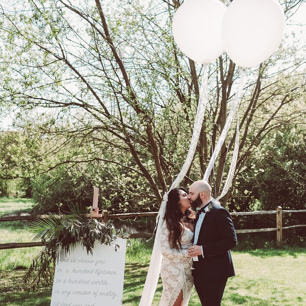 Bride in Grace Loves Lace Wedding Dress | Groom in Tuxedo | Giant Balloons | Lemonade Pictures