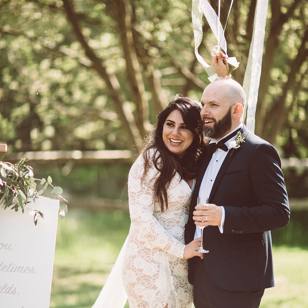 Bride in Grace Loves Lace Wedding Dress | Groom in Tuxedo | Giant Balloons | Lemonade Pictures