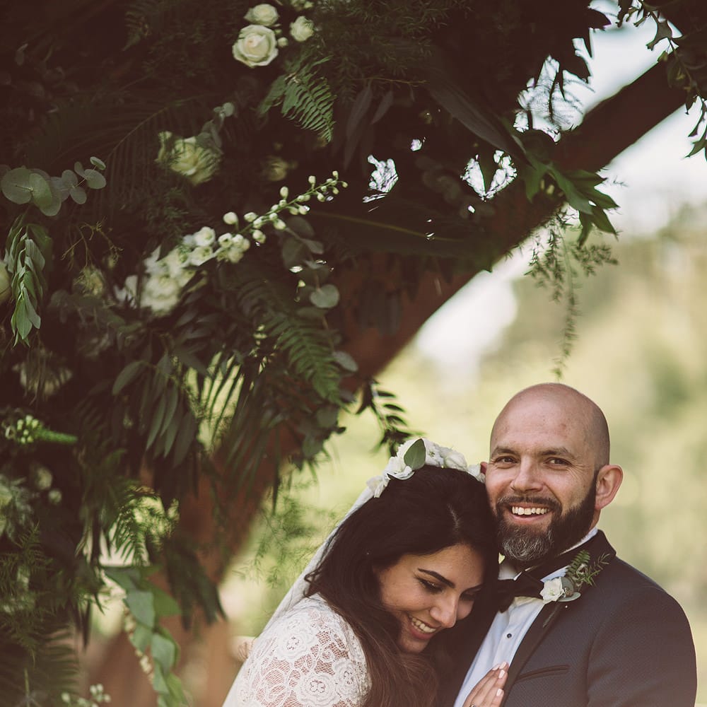 Bride in Grace Loves Lace Wedding Dress | Groom in Tuxedo | Lemonade Pictures