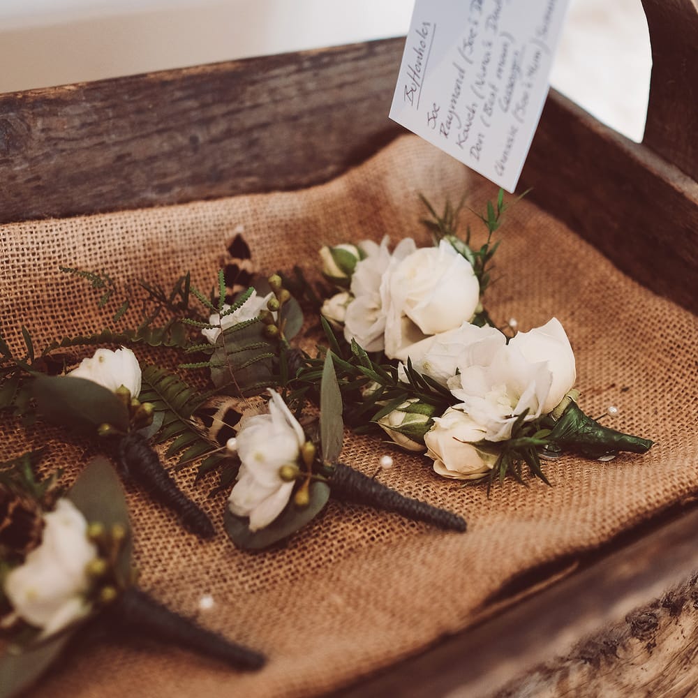 White Buttonholes | | Botanical Outdoor Wedding at Millbridge Court | Lemonade Pictures
