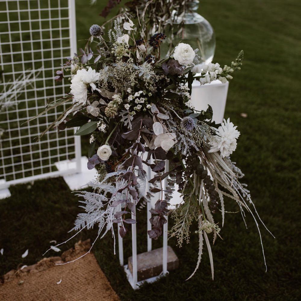 White & Grey Floral Arrangement by Swaffham Florist | Nocturn Wedding Inspiration Planned & Styled by The Little Lending Company | Florals by Swaffham Florist | Agnes Black Photography | Film by The Wilde Bride