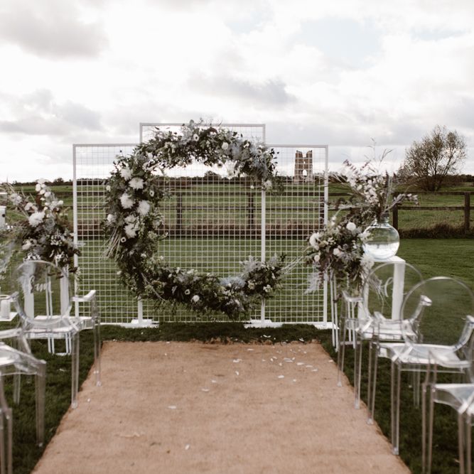 Aisle & Altar Style | Moon Gate Floral Arch by Swaffham Florist | Ghost Chairs | Nocturn Wedding Inspiration Planned & Styled by The Little Lending Company | Agnes Black Photography | Film by The Wilde Bride