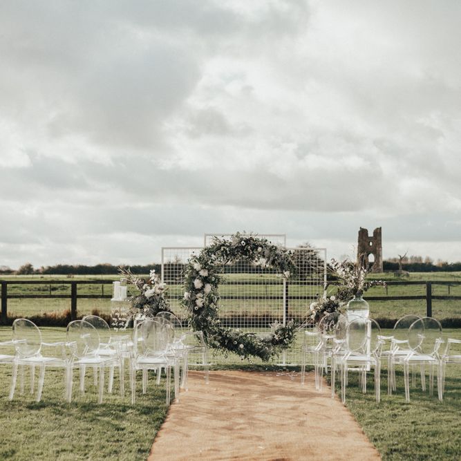 Moon Gate Altar | Ghost Chairs | Perspex Pew Ends | Nocturn Wedding Inspiration Planned & Styled by The Little Lending Company | Florals by Swaffham Florist | Photography & Film by The Wilde Bride