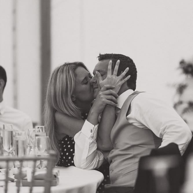 Wedding Guests Kissing