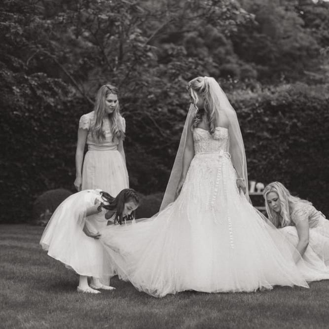 Bride in Monique Lhuillier Candy Wedding Dress & Bridesmaids in Pink BHLDN Dresses