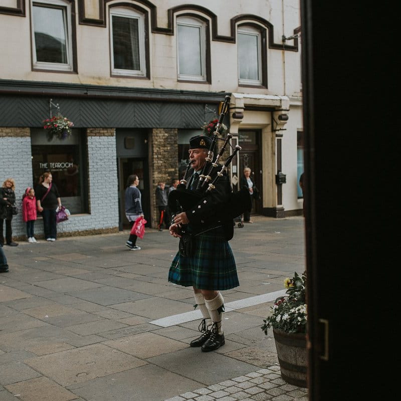 Traditional Scottish Bagpiper in Kilt
