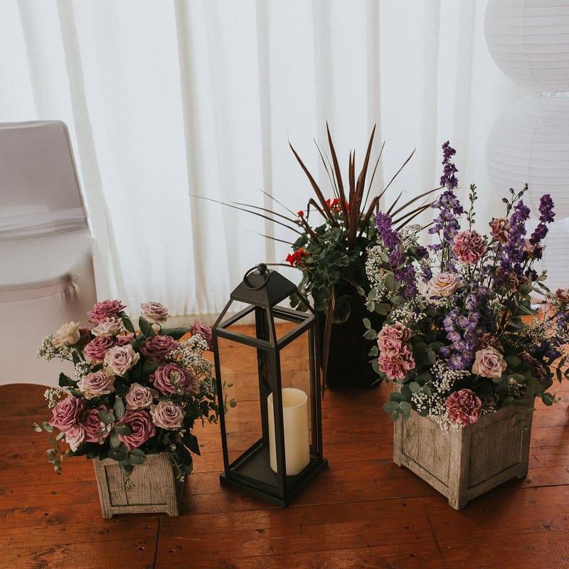 Hurricane Lamps & Wooden Crates Full of Wild Flowers Rustic Wedding Decor