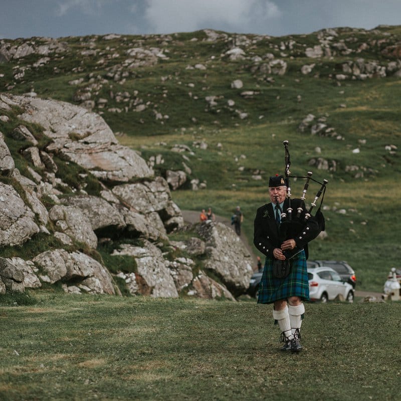 Traditional Scottish Bag Piper in Kilt