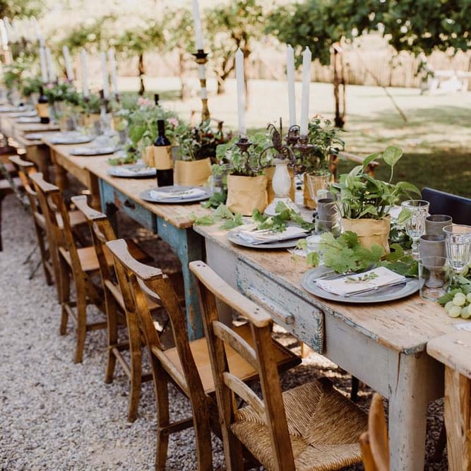 Rustic Wedding In Italy At Locanda Rosa Rosae With Intimate Candle Lit Dinner At Wooden Table With Fresh Fruit Decor