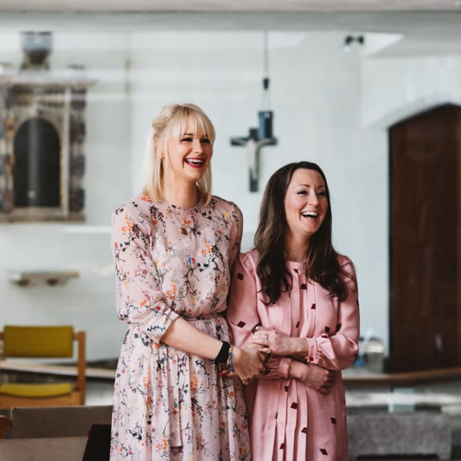 Wedding Guests In Pink Floral Dresses