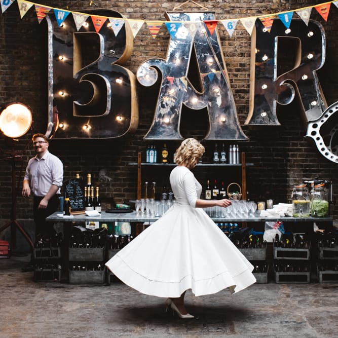 Bride In Delphine Manivet Wedding Dress