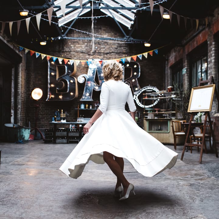 Bride In Delphine Manivet Wedding Dress