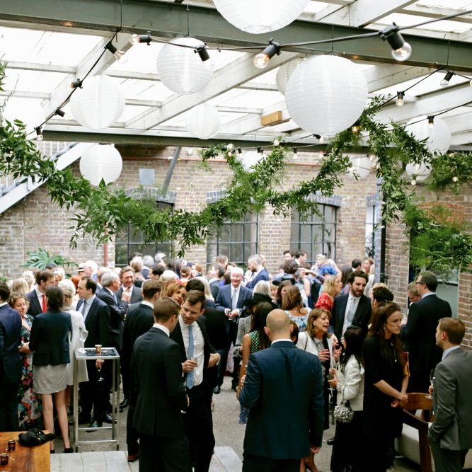 Hanging Paper Lanterns | Strung Up Greenery Garland | Dasha Caffrey Photography