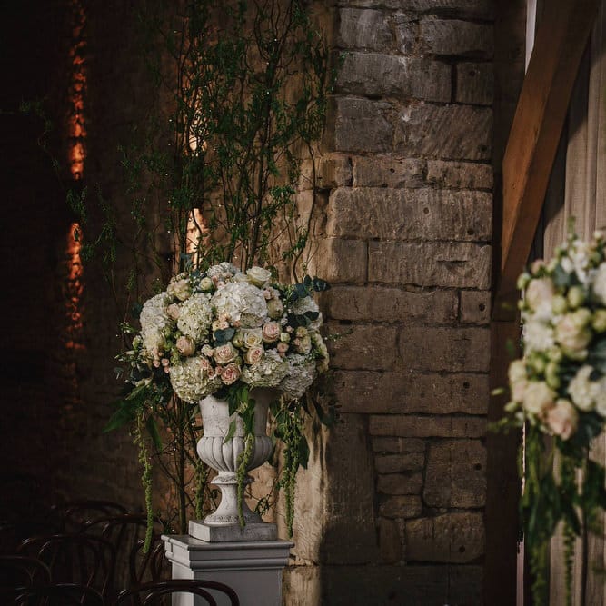 Cripps Barn Ceremony Room | Floral Arrangements | Andy Gaines Photography | Thompson Granger Films