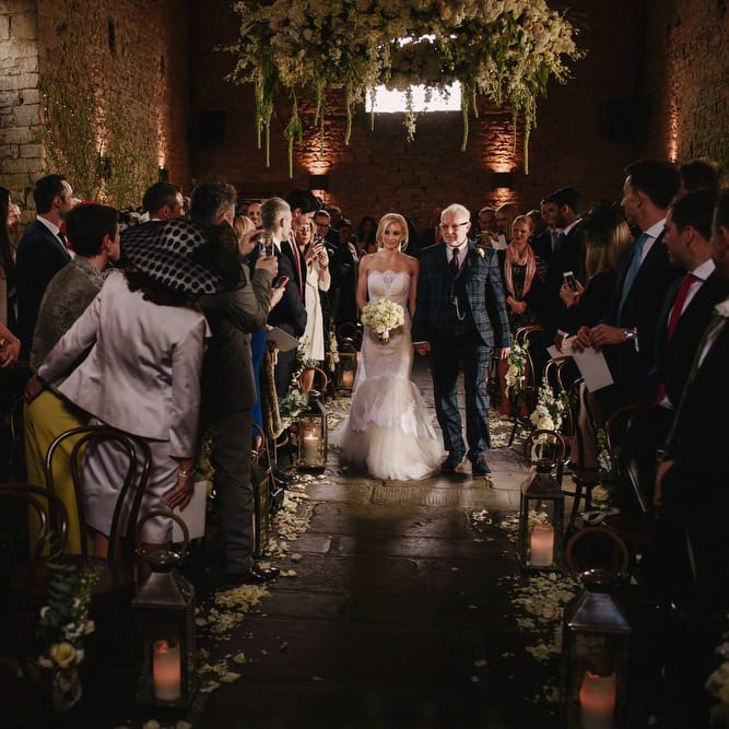 Cripps Barn Bridal Entrance | Bride in Christos Costarellos Fishtail Gown | Andy Gaines Photography | Thompson Granger Films