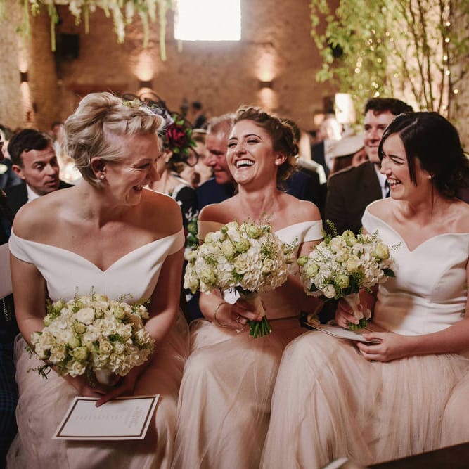 Cripps Barn Wedding Ceremony | Bridesmaids in Blush Pink Tulle Skirts & White Top Separates | Andy Gaines Photography | Thompson Granger Films