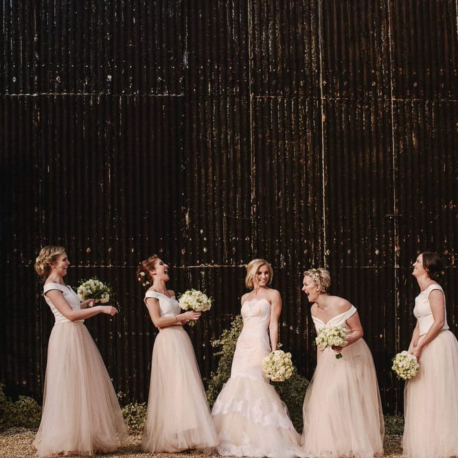 Bride in Christos Costarello Wedding Dress | Bridesmaids in Blush Pink Tulle Skirts & White Top Separates | Andy Gaines Photography | Thompson Granger Films