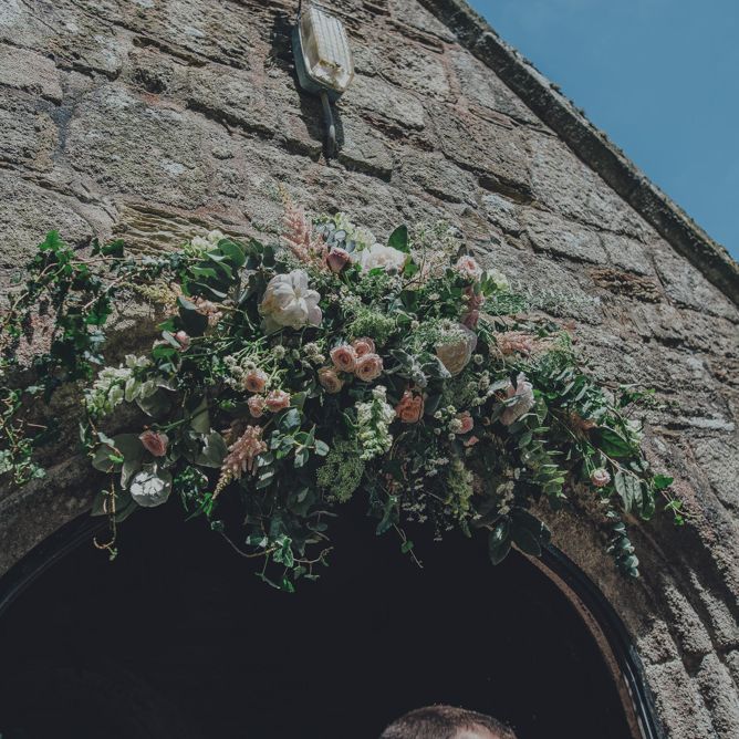 Floral Arch Outside Church