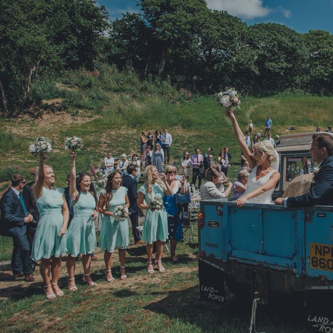Bride & Groom In Vintage Land Rover