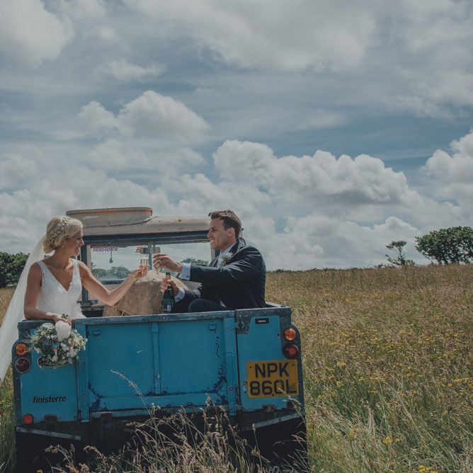 Bride & Groom In Vintage Land Rover