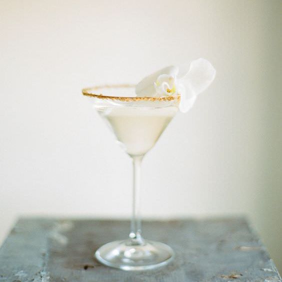White Cosmopolitan Wedding Cocktail | Summer Styling Reimagined | Image via <a href="https://www.stylemepretty.com/2013/04/09/st germain signature cocktail inspired by vintage glamor/" rel="noopener" target="_blank">Style Me Pretty</a> | Image by <a href="https://www.whiteloftstudio.com " rel="noopener" target="_blank”>White Loft Studio</a>