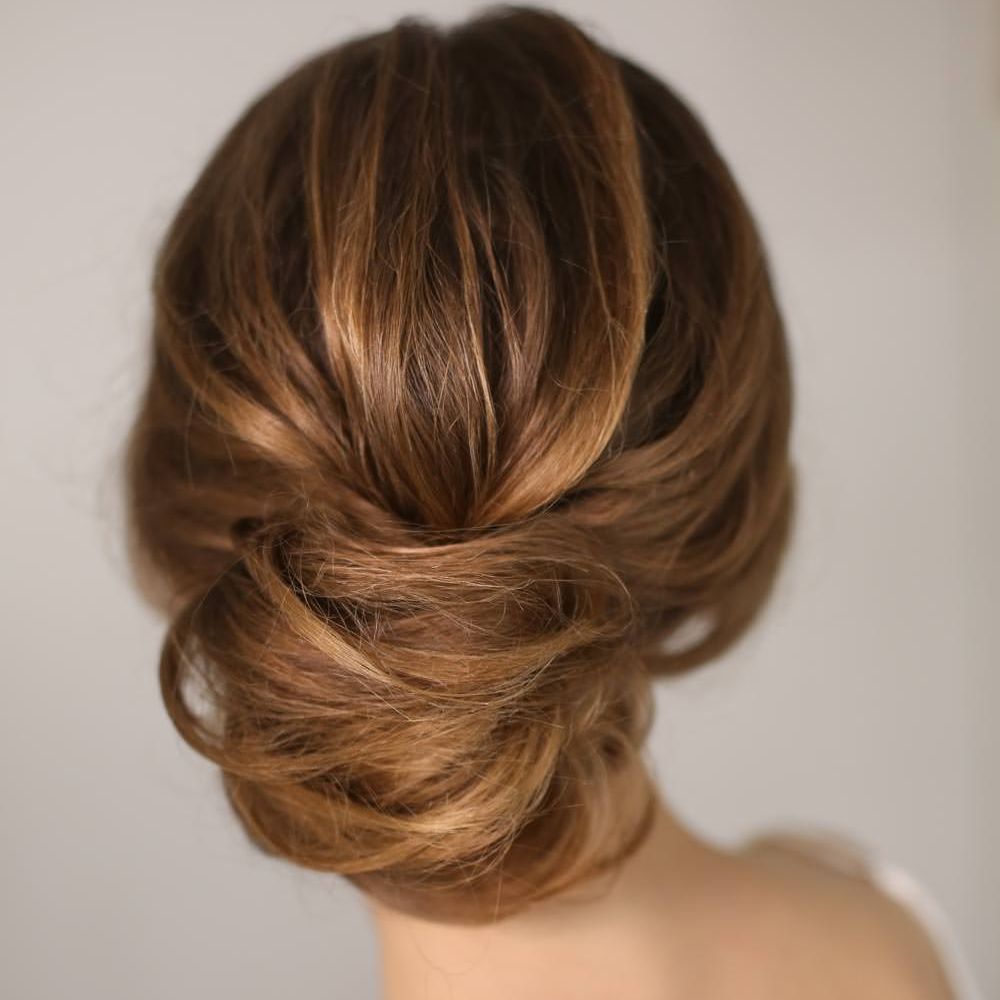 Stunning Bridal Hair Bun | Summer Styling Reimagined | Hair Styling, Make Up and Image by <ahref="https://kristinagasperas.com/" rel="noopener" target="_blank”>Kristina Gasperas</a>