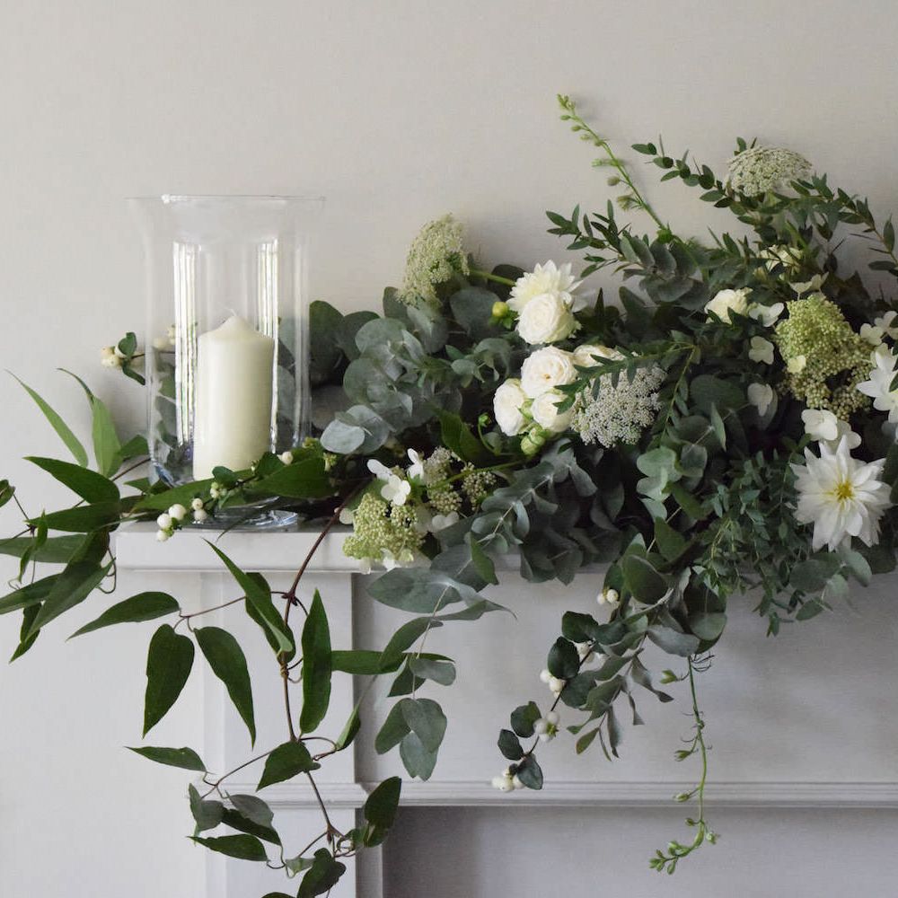 Fireplace Adorned with Florals | Summer Styling Reimagined | Florals by <a href="https://mirandahackettflowers.co.uk/ " rel="noopener" target="_blank”>Miranda Hackett Flowers</a>