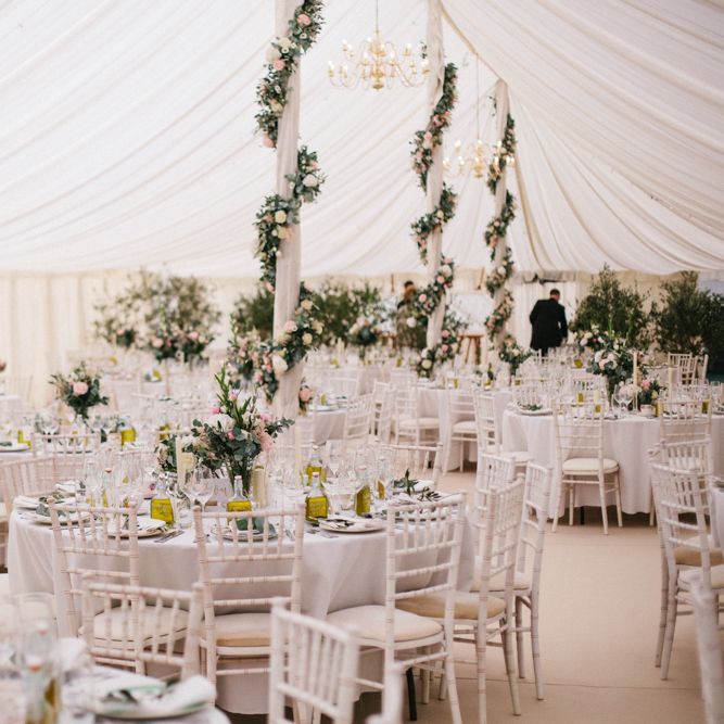 Floral Arrangements On Marquee Poles By Whites Flowers
