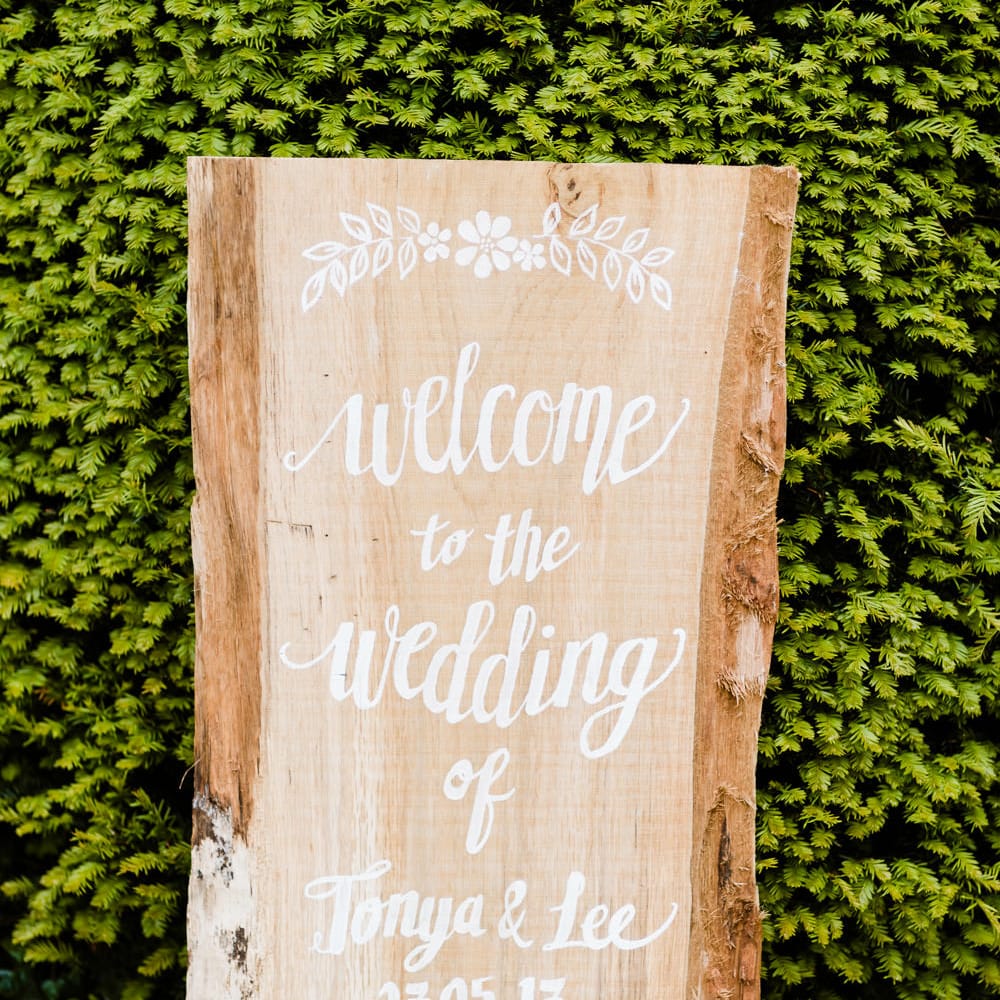 Wooden Wedding Welcome Sign | Outdoor Ceremony & Rustic Barn Reception at Pennard House Somerset | John Barwood Photography