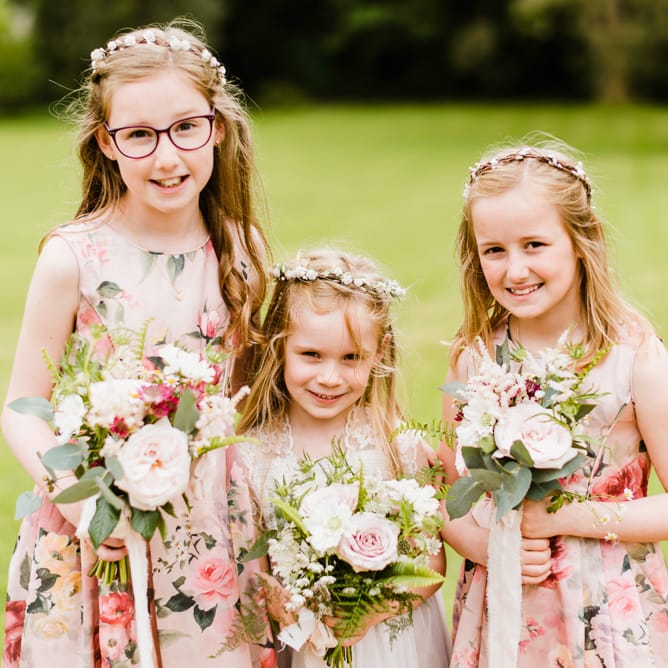 Flower Girls in monsoon Dresses | Outdoor Ceremony & Rustic Barn Reception at Pennard House Somerset | John Barwood Photography