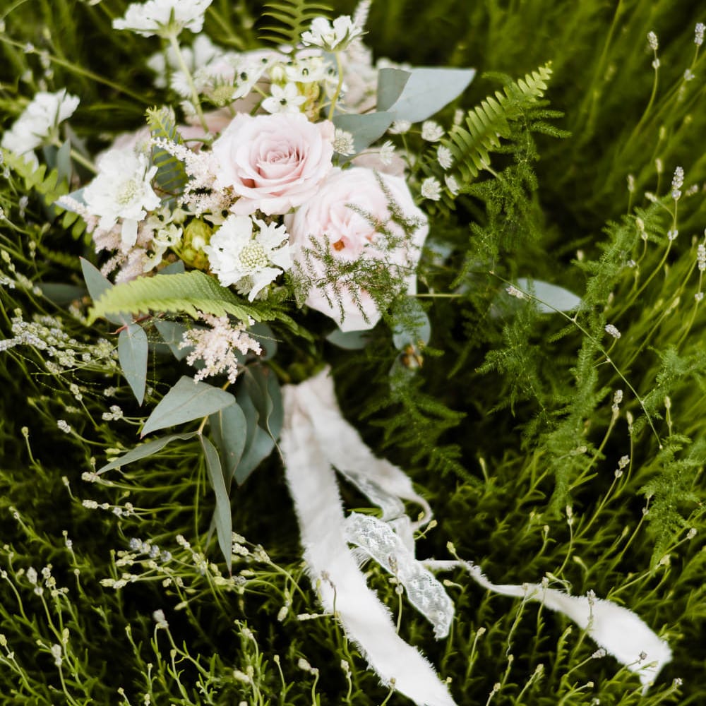 Romantic Bridal Bouquet with Ribbon | Outdoor Ceremony & Rustic Barn Reception at Pennard House Somerset | John Barwood Photography