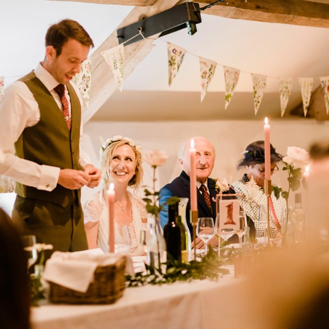 Speeches | Bride in Jenny Packham Gown | Groom in Hugo Morris Tweed Suit | Outdoor Ceremony & Rustic Barn Reception at Pennard House Somerset | John Barwood Photography