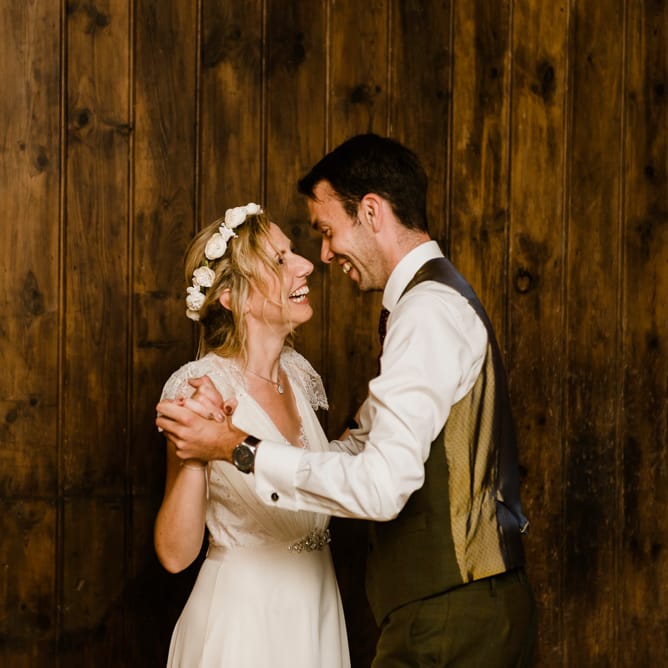 First Dance | Bride in Jenny Packham Gown | Groom in Hugo Morris Tweed Suit | Outdoor Ceremony & Rustic Barn Reception at Pennard House Somerset | John Barwood Photography