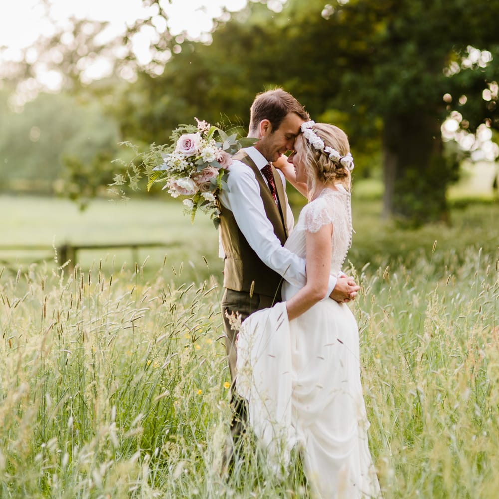 Bride in Jenny Packham Gown | Groom in Hugo Morris Tweed Suit | Outdoor Ceremony & Rustic Barn Reception at Pennard House Somerset | John Barwood Photography