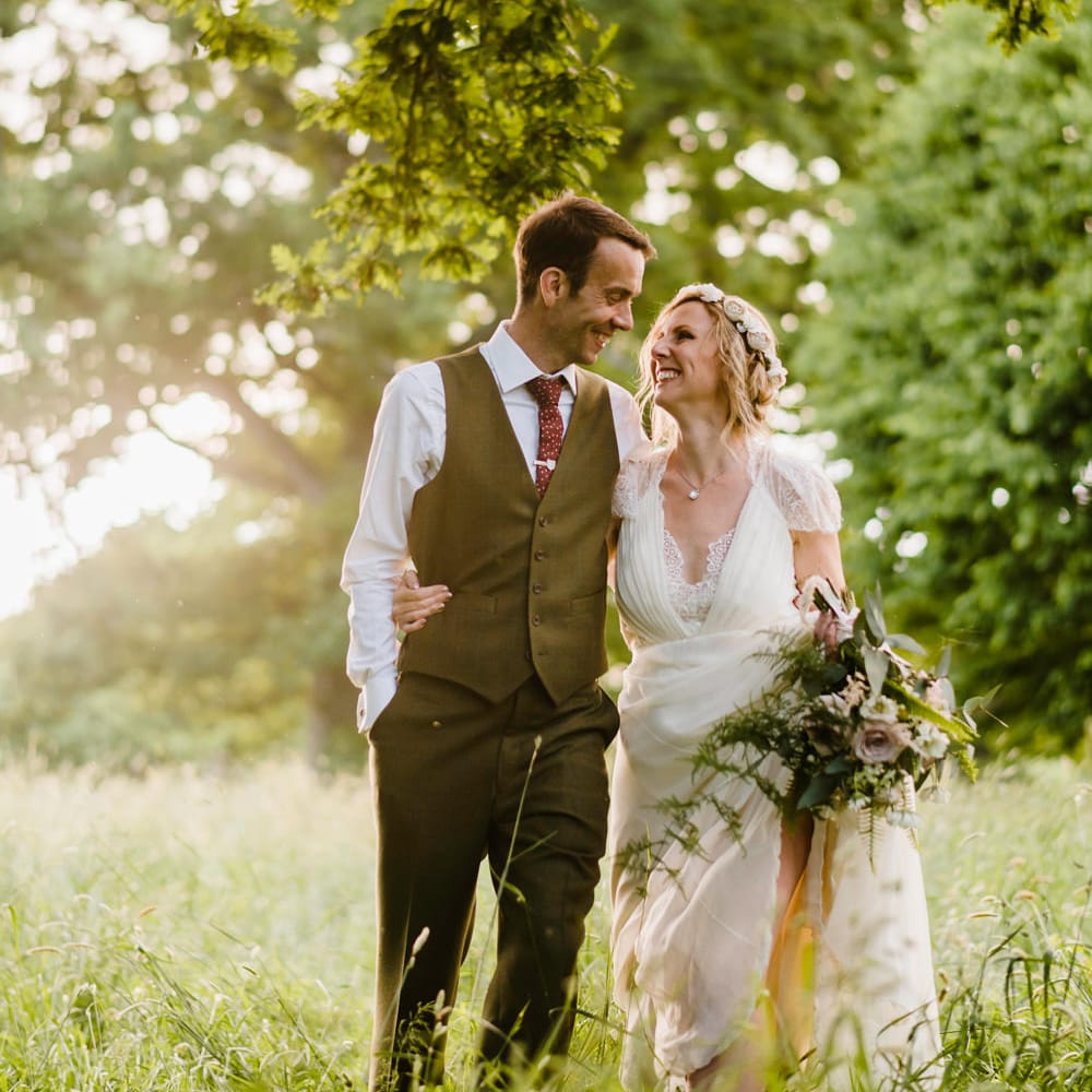 Bride in Jenny Packham Gown | Groom in Hugo Morris Tweed Suit | Outdoor Ceremony & Rustic Barn Reception at Pennard House Somerset | John Barwood Photography