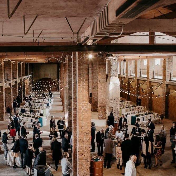 Industrial Wedding Venue with Festoon Lights | That Day Wedding Planner | Carla Penoncelli PhotographyIndustrial Wedding Venue with Festoon Lights | That Day Wedding Planner | Carla Penoncelli Photography