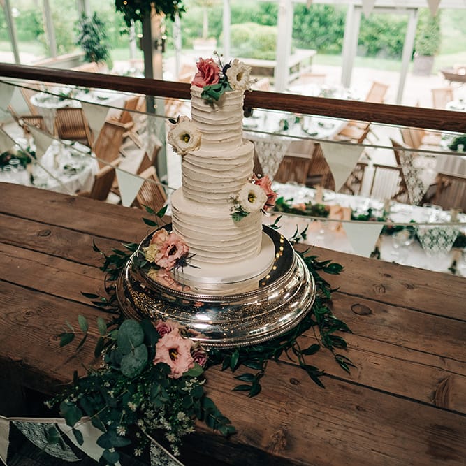 Buttercream Wedding Cake // Rue De Seine Bride For A Stone Barn Wedding With Wedding Party In Soft Pink And Navy And Images From Jason Mark Harris With Film By Harris Films