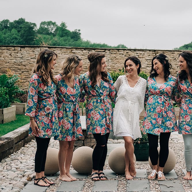 Bridesmaids In Floral Robes For Pre Wedding // Rue De Seine Bride For A Stone Barn Wedding With Wedding Party In Soft Pink And Navy And Images From Jason Mark Harris With Film By Harris Films