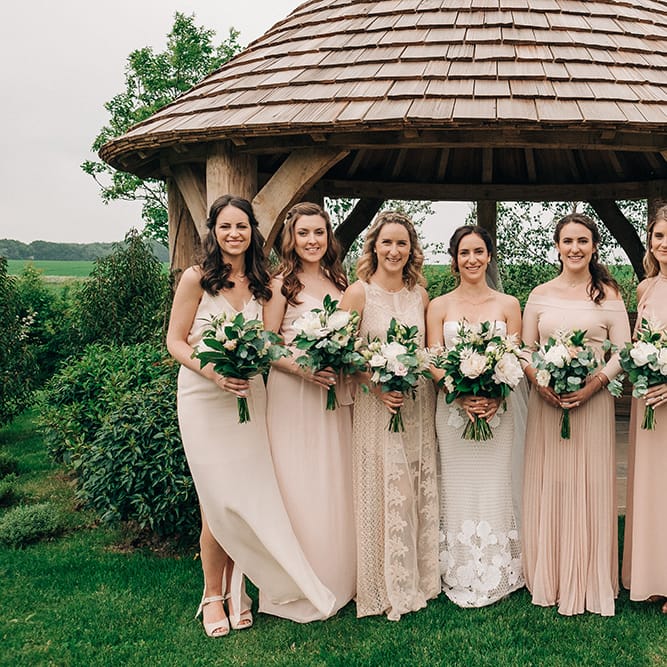 Bridesmaids In Pale Pink Dresses // Rue De Seine Bride For A Stone Barn Wedding With Wedding Party In Soft Pink And Navy And Images From Jason Mark Harris With Film By Harris Films