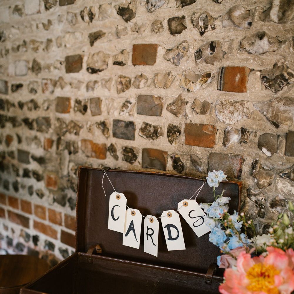 Vintage Suitcase Wedding Decor | DIY Wedding at Upwaltham Barns with Bright Flowers | Danielle Victoria Photography