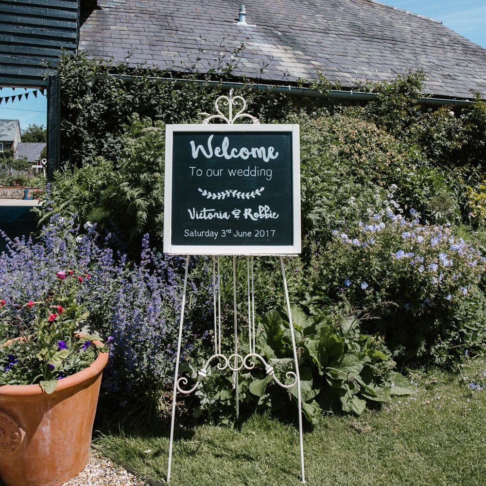 Chalkboard Wedding Sign | DIY Wedding at Upwaltham Barns with Bright Flowers | Danielle Victoria Photography