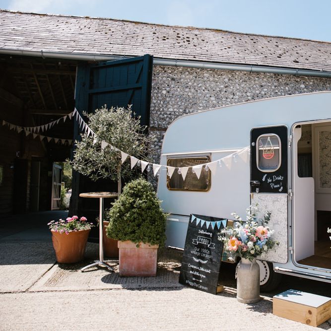 Vintage Caravan Photo Booth | DIY Wedding at Upwaltham Barns with Bright Flowers | Danielle Victoria Photography