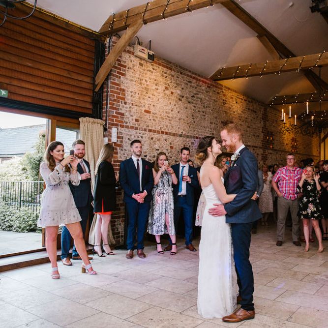 First Dance | Bride in Sarah Seven Gown | Groom in Ted Baker & Next | DIY Wedding at Upwaltham Barns with Bright Flowers | Danielle Victoria Photography
