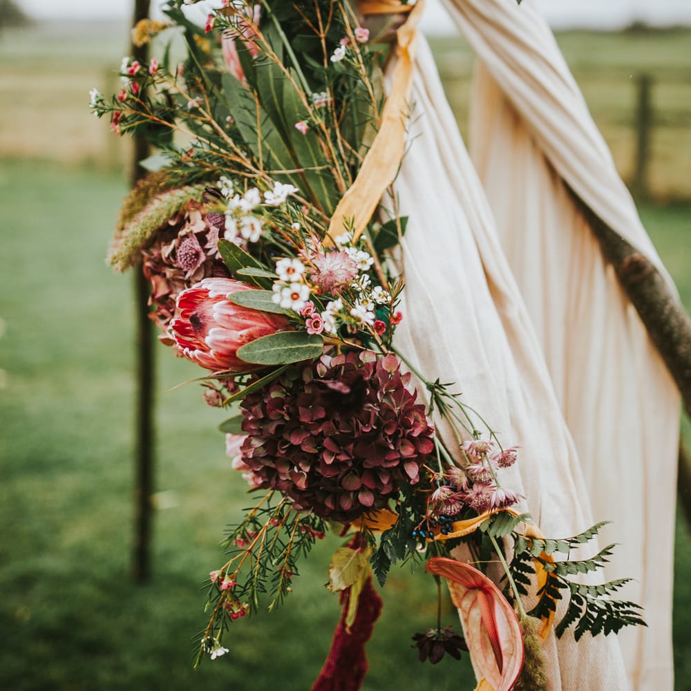 Naked Tipi Wedding Altar & Hay Bale Seating For Wedding Ceremony