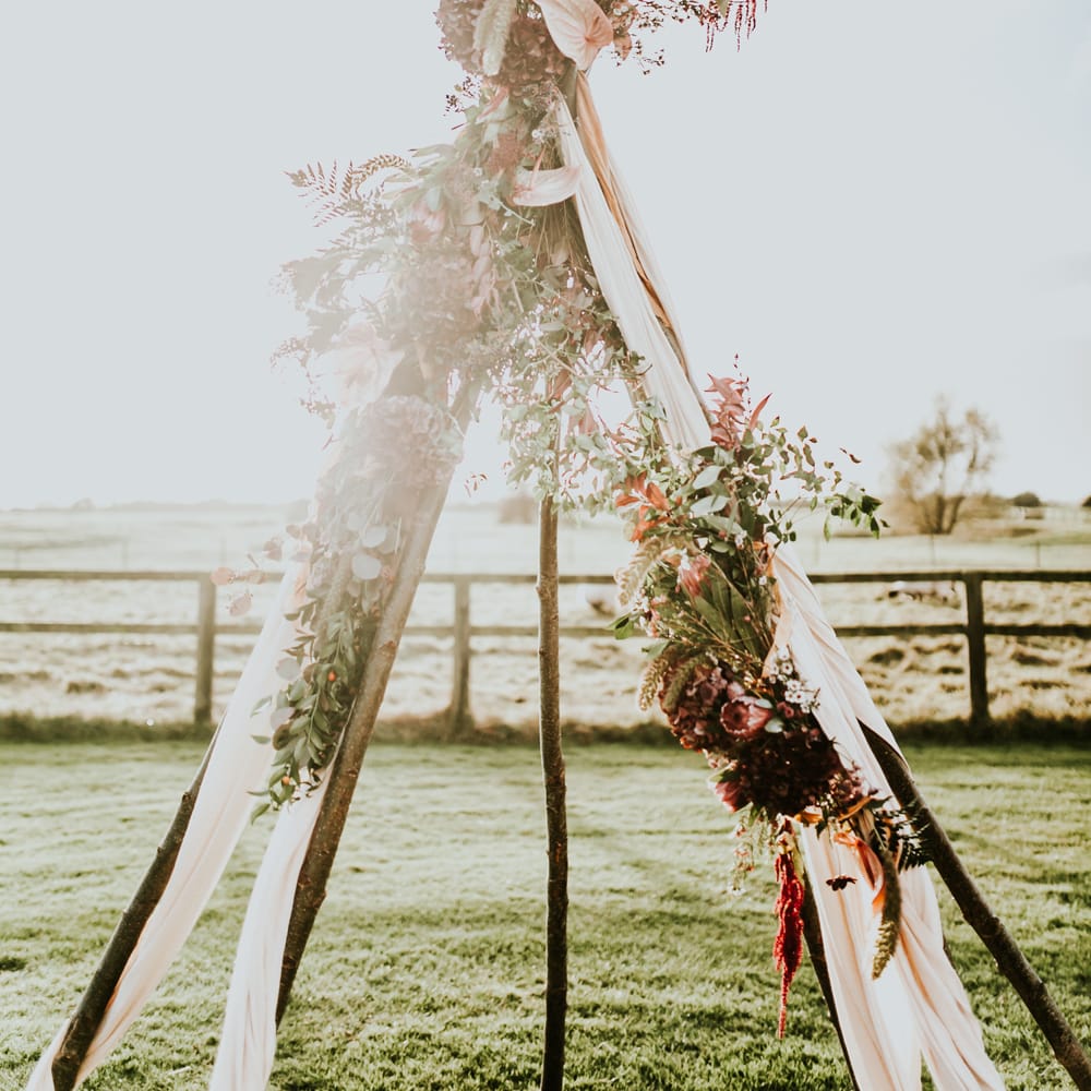 Naked Tipi Wedding Altar & Hay Bale Seating For Wedding Ceremony