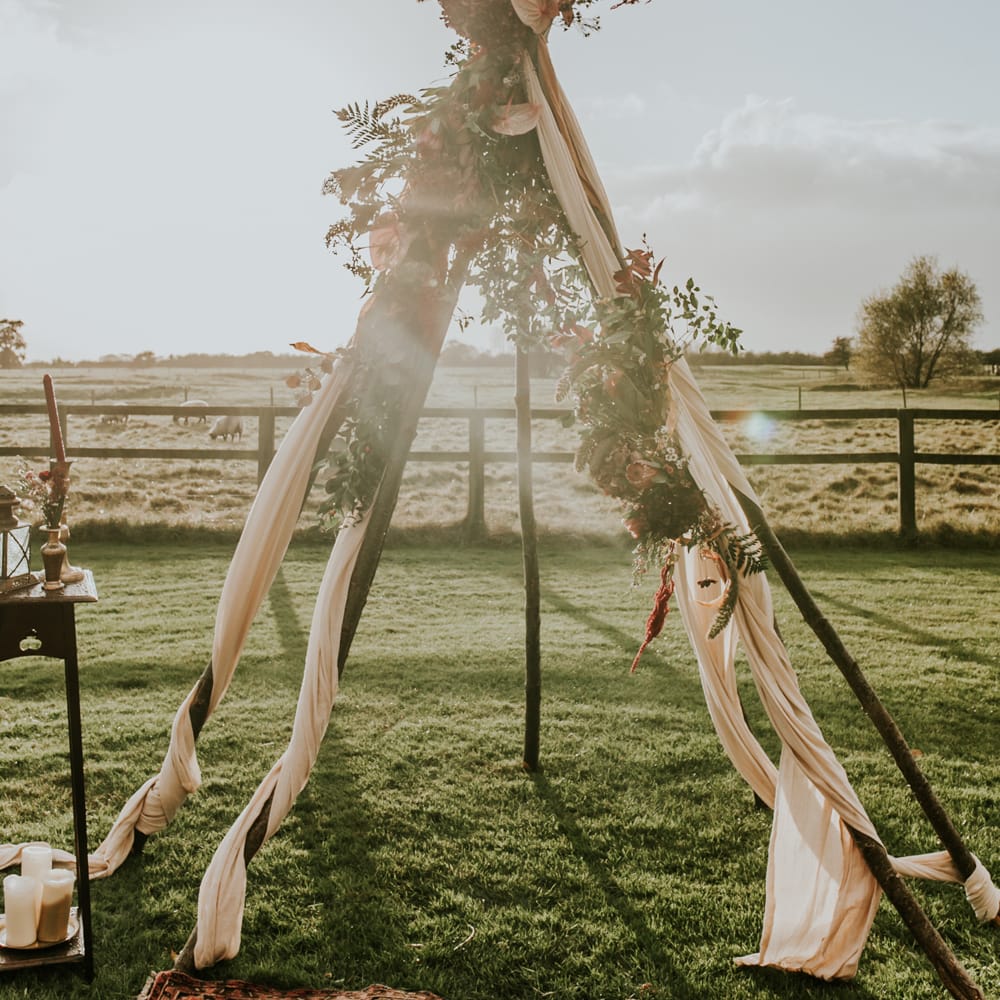 Naked Tipi Wedding Altar & Hay Bale Seating For Wedding Ceremony